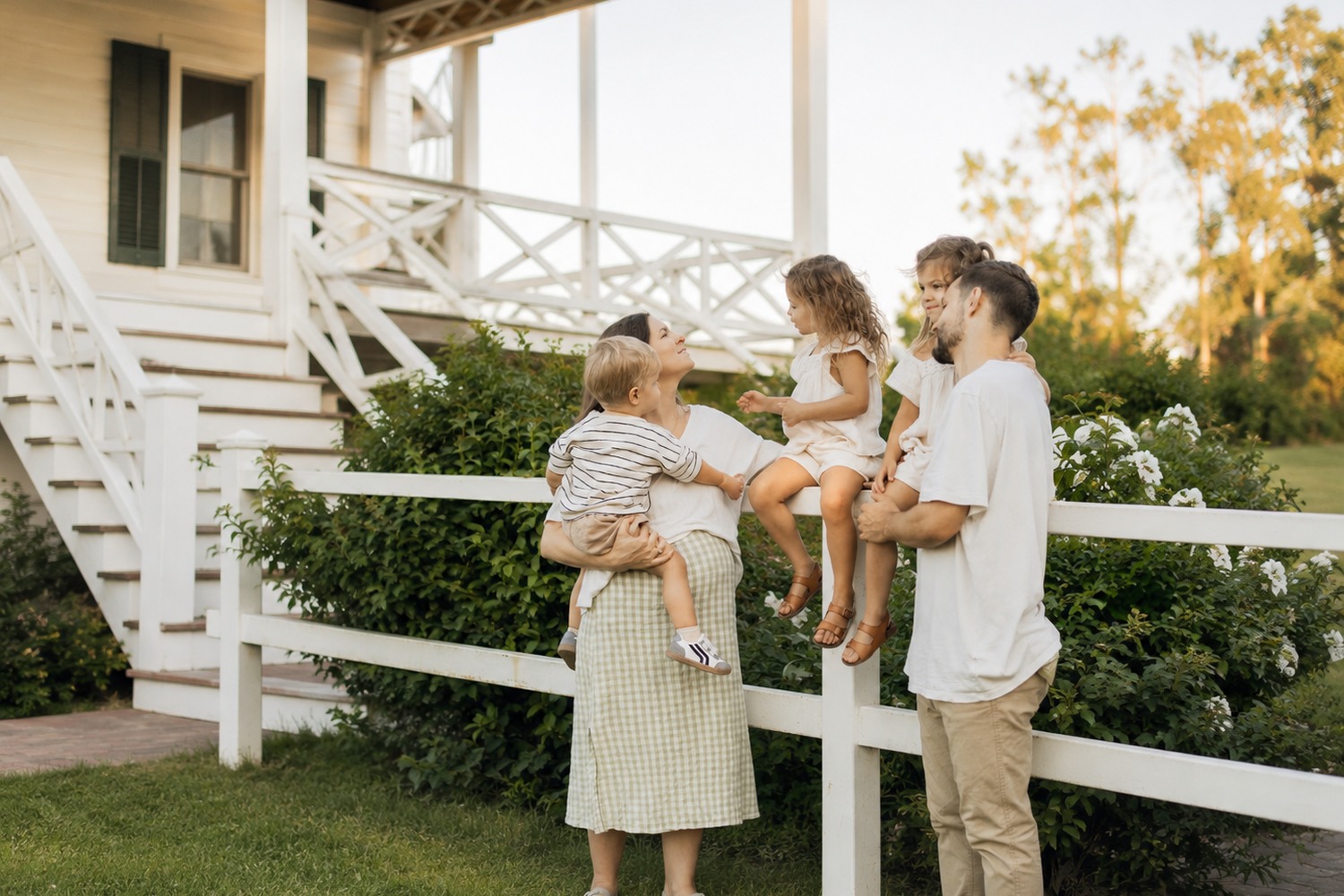 Family spending time together outside a country home